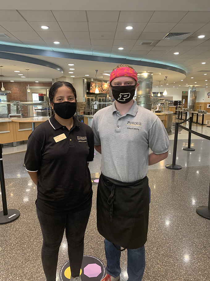 Noor Elmahdi (left) and Townsend Lambert, student staff members in Ford Dining Court.